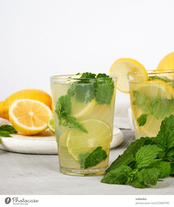 summer refreshing drink lemonade Fruit Candy Herbs and spices Beverage Lemonade Juice Alcoholic drinks Summer Table Leaf Cool (slang) Fresh Juicy Sour Yellow