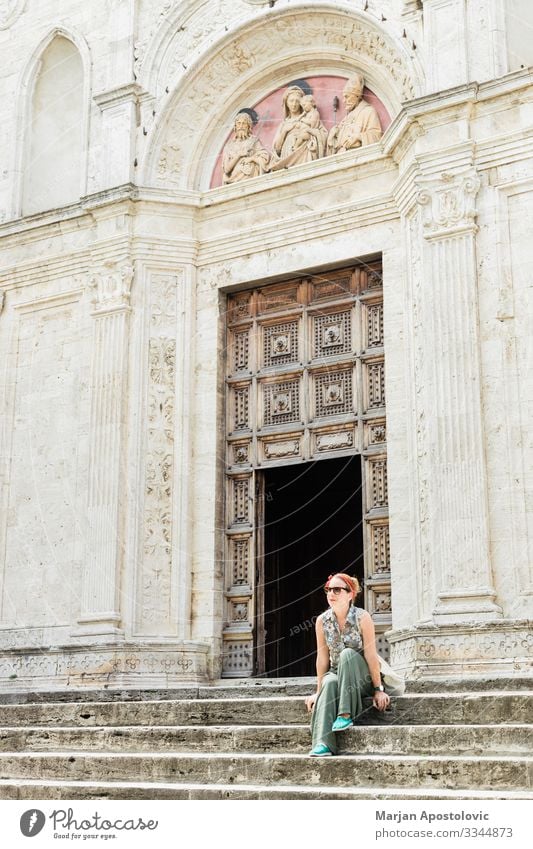 Young woman on church steps in old town in Italy Lifestyle Vacation & Travel Tourism Trip Sightseeing City trip Human being Feminine Youth (Young adults) Woman