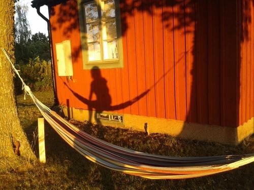 an empty hammock Relaxation Calm Summer Summer vacation Loneliness Hammock Colour photo Exterior shot Deserted Day Light Shadow Silhouette