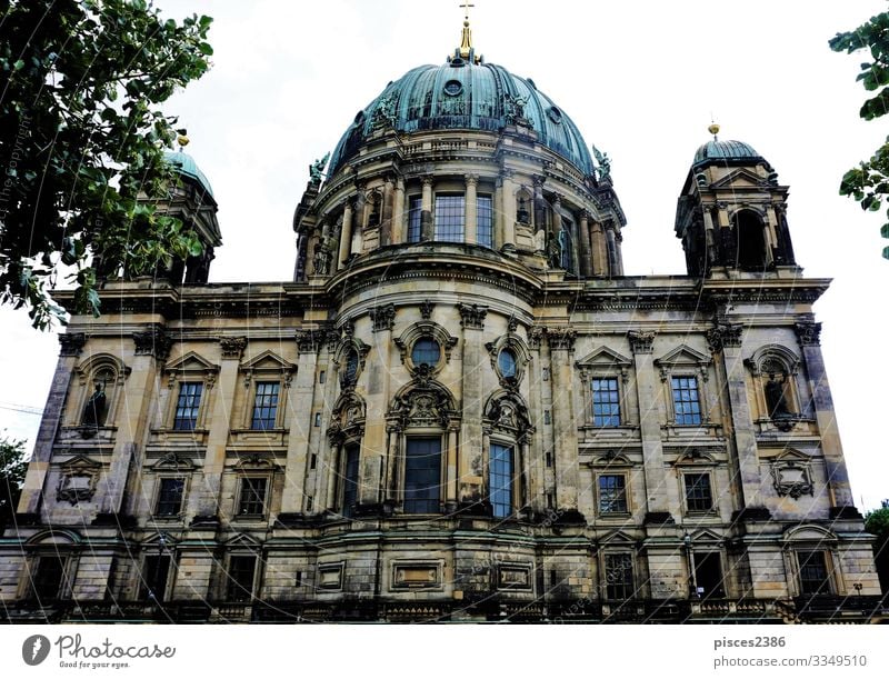 The Berlin cathedral behind trees Design Vacation & Travel Museum Downtown Dome Religion and faith ancient architecture attraction building capital