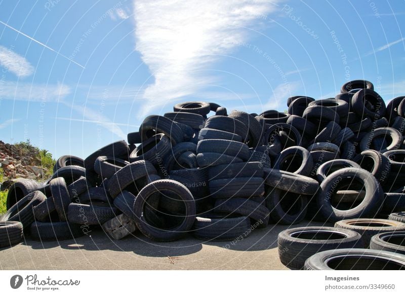 Garbage dump a bunch of tires, used old tires, a lot of car and truck tires at a garbage dump. Ecological background. Scrap yard Landfill Background Dispose of
