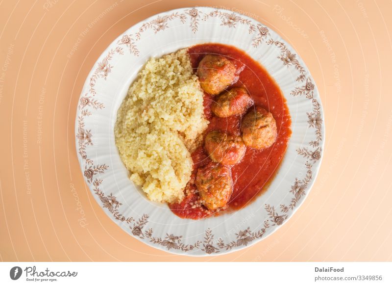 Meatballs with typical Moroccan couscous Dinner Plate Tradition Kefta Marrakesh Morocco background brown background Cereals cous-cous Cooking cuscus food hanout