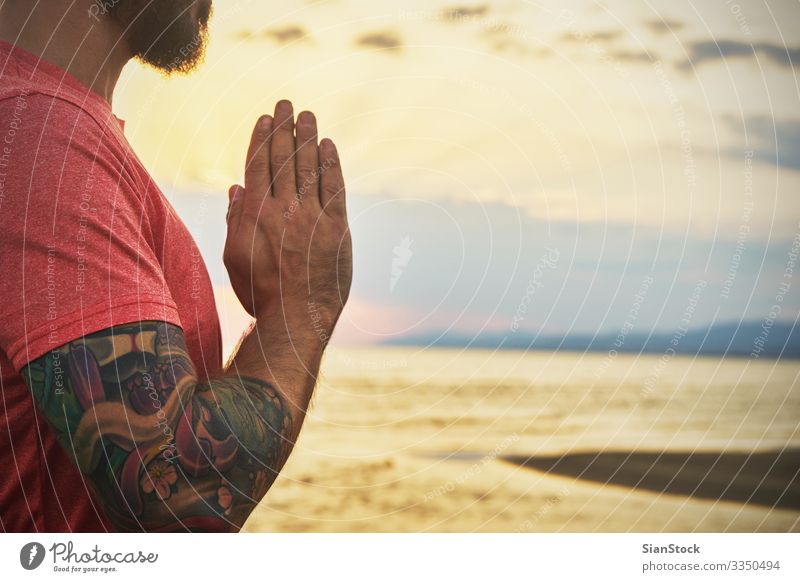 Man practicing yoga in various poses (asana) by the sea Lifestyle Beautiful Body Wellness Harmonious Relaxation Meditation Summer Beach Ocean Sports Yoga