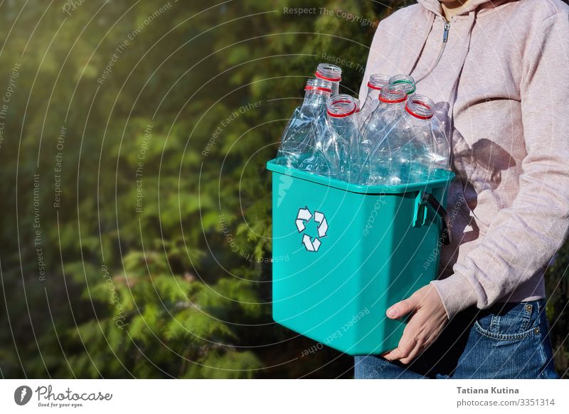 hands carry a box of plastic for recycling. Bottle Save Face Work and employment Craft (trade) Human being Environment Container Paper Plastic Smiling Carrying