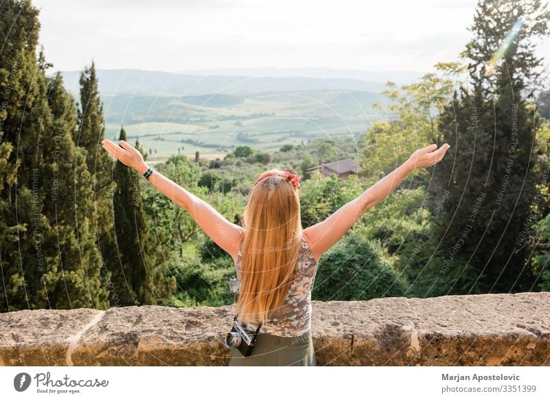 Young woman enjoying the view of the Tuscany landscape Lifestyle Vacation & Travel Tourism Trip Adventure Freedom Sightseeing Human being Feminine