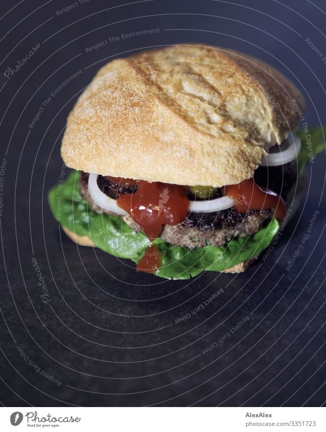 Hamburger sandwich with bread roll Food Meat Lettuce Salad Roll Ketchup Onion Fast food Delicious Finger food American Cuisine Eating Fragrance Esthetic