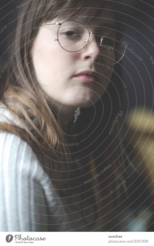 girl with glasses Girl Young woman Youth (Young adults) Face portrait pretty Looking Half-profile Puberty Self doubt Meditative Self-confident Snapshot