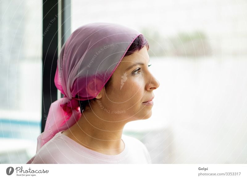 Woman with pink scarf on the head. Cancer awareness Happy Illness Relaxation Hospital Adults Scarf Bald or shaved head Smiling Strong Pink Self-confident Hope