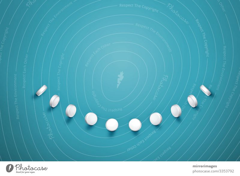 line of pills making a white smile on teal background Nutrition Diet Elegant Style Joy Happy Face Healthy Health care Medical treatment Healthy Eating