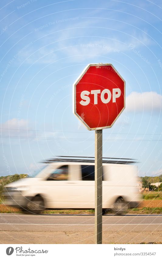 Stop sign in front of road entrance, passing delivery van with motion blur 1 Human being Sky Climate change Beautiful weather Transport Road traffic Motoring