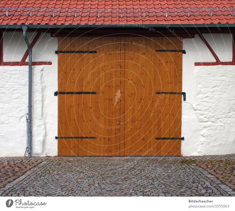 barn door Garage door Barn Storage shed Wooden gate Wooden board Shed Wooden door Wooden wall Hinge Door handle Facade Wall (building) Front door Main gate