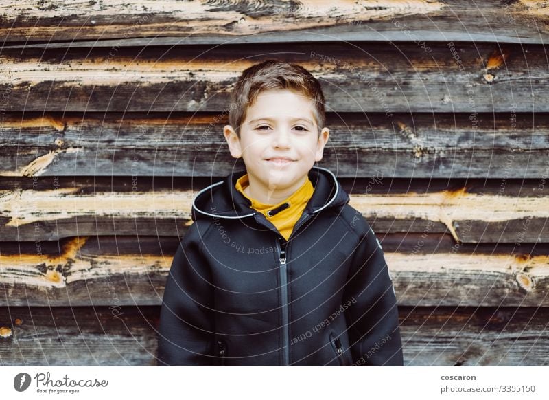 Portrait of a beutiful kid with a wooden background Lifestyle Style Happy Beautiful Vacation & Travel Child Human being Masculine Toddler Boy (child) Infancy 1