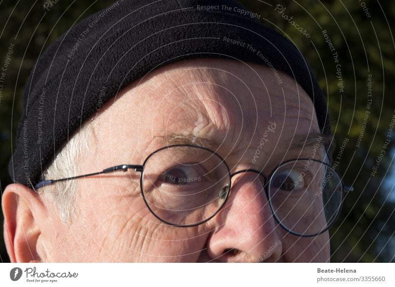 Spooky 8 Man critical Eyeglasses eyes Looking Skeptical portrait Looking into the camera Masculine Cap