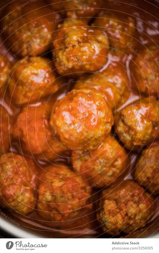 Delightful meatballs with tomato sauce rustic beverage table plate delicious food meal homemade gourmet dinner lunch cuisine dish recipe minced nutrition tasty