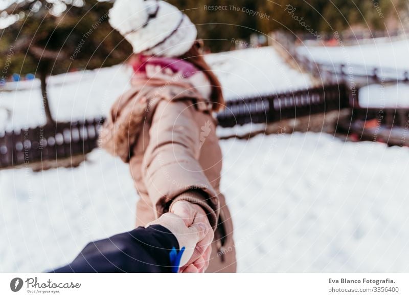 follow me. woman and man holding hands. pov. winter season at the mountain. Love concept Woman Man Hand Snow Winter boyfriend girlfriend Hold Valentine's Day