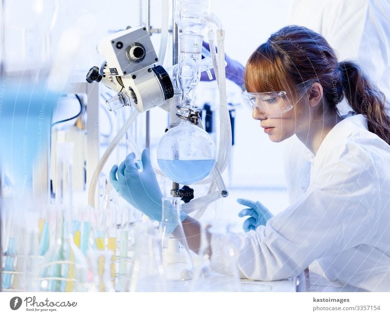 Young female chemists researching in life science laboratory. Health care Medication Science & Research Laboratory Examinations and Tests Work and employment