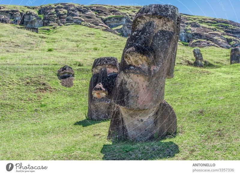 Pair of underground moai on the extinct volcano Rano Raraku Vacation & Travel Tourism Adventure Summer Head Face Art Work of art Sculpture Culture Landscape