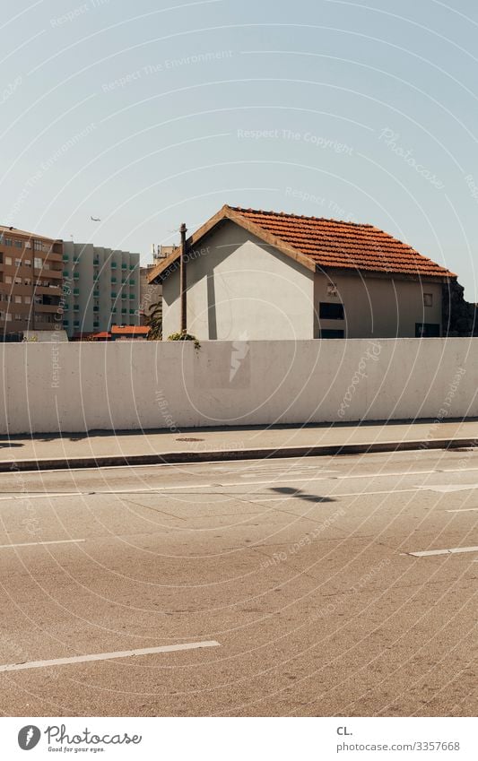 postage paid House (Residential Structure) Street Wall (barrier) Wall (building) Sky Blue sky Cloudless sky Lanes & trails High-rise Apartment Building Portugal