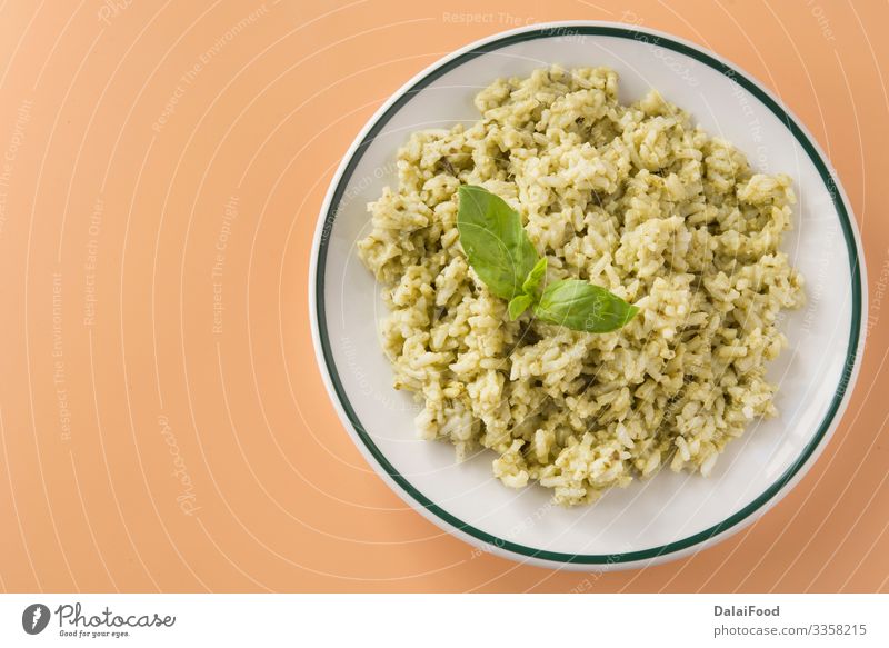 Rice with basil pesto sauce Lunch Vegetarian diet Plate Tradition Basil brown background Cooking Coriander ecuatorian rice food Gourmet green rice healthy