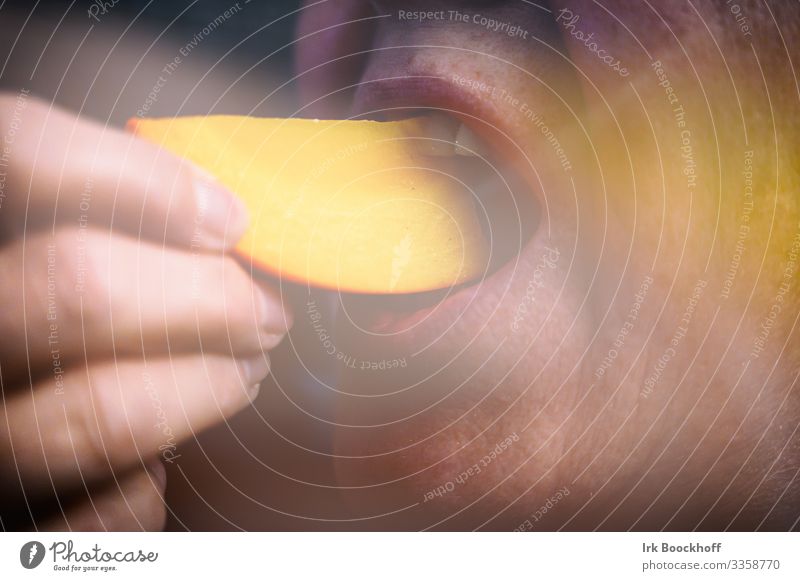 Woman eating khaki fruit in close-up Fruit Khaki Eating Organic produce Vegetarian diet Healthy Adults Life Mouth 1 Human being 30 - 45 years Diet To enjoy