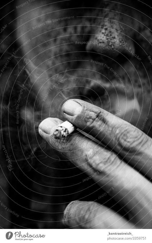 cigarette in hand # #smoke #cigarette #mono #mud #type #unhealthy #tobacco #man bnw Contrast Detail detail Deep depth of field Close-up Exterior shot Dirty