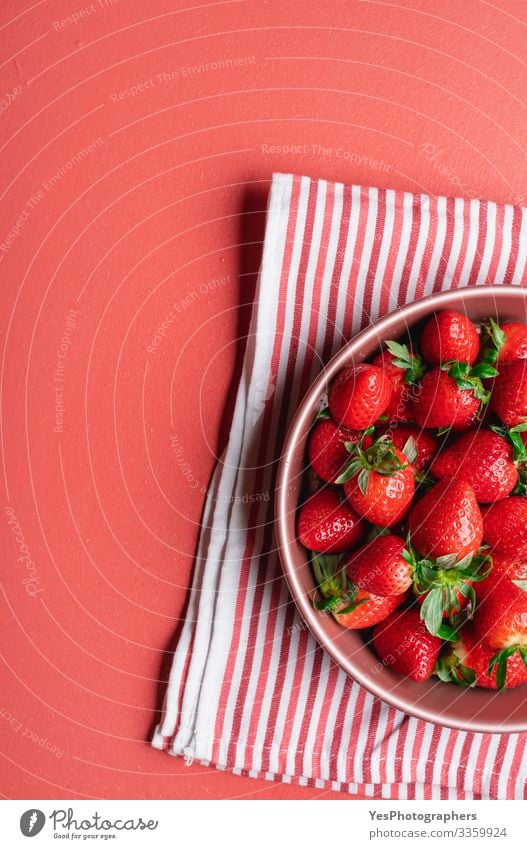 Organic strawberries in a tray on table. Fresh summer fruits Fruit Dessert Organic produce Vegetarian diet Diet Plate Bowl Delicious Natural Sweet Red
