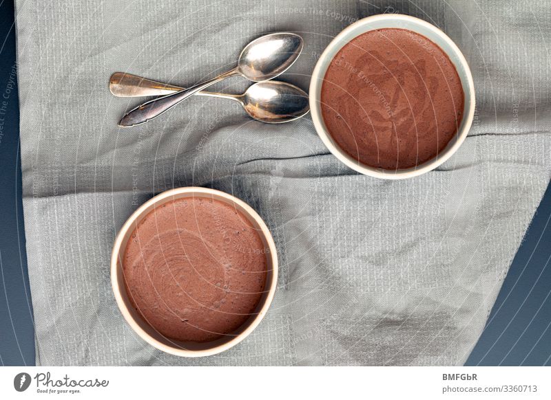 Delicious chocolate mousse Food Dessert Candy Chocolate Mousse au chocolat Nutrition Crockery Bowl Cutlery Spoon Dessert spoon Dish towel Sweet Brown To enjoy