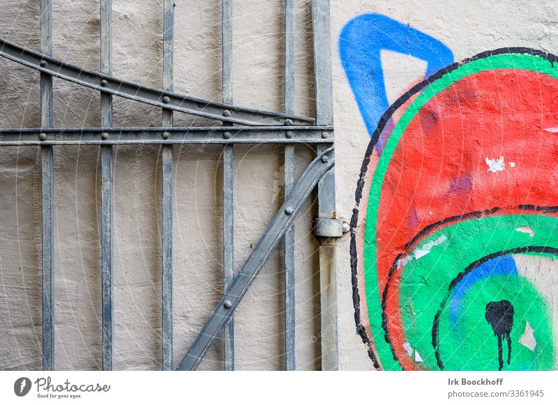 Graffiti of a cat next to the entrance gate Living or residing Goal Subculture Downtown Wall (barrier) Wall (building) Door Stone Metal Cute Emotions