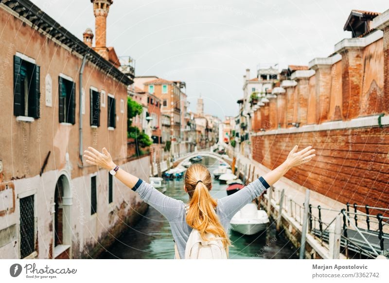 Young woman enjoying the view of the canal in Venice Lifestyle Joy Vacation & Travel Tourism Trip Adventure Freedom Sightseeing City trip Human being Feminine