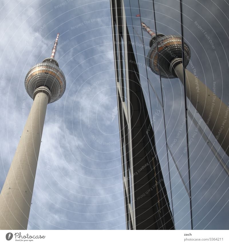 twins Sky Clouds Beautiful weather Berlin Town Capital city Downtown Tower Facade Window Tourist Attraction Landmark Berlin TV Tower Television tower Large Tall