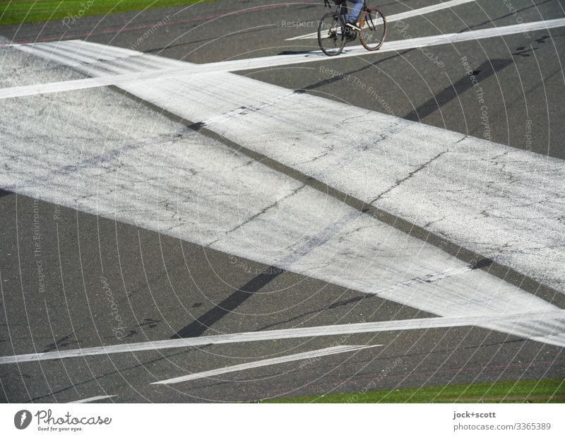 Cyclist appears on the line from the airfield Double exposure lines Experimental Runway Mobility free time Structures and shapes Leisure and hobbies