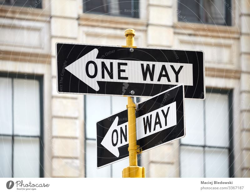 One way street signs in New York City. Vacation & Travel Sightseeing City trip Town Downtown Building Transport Road traffic Street Road sign Arrow Advice