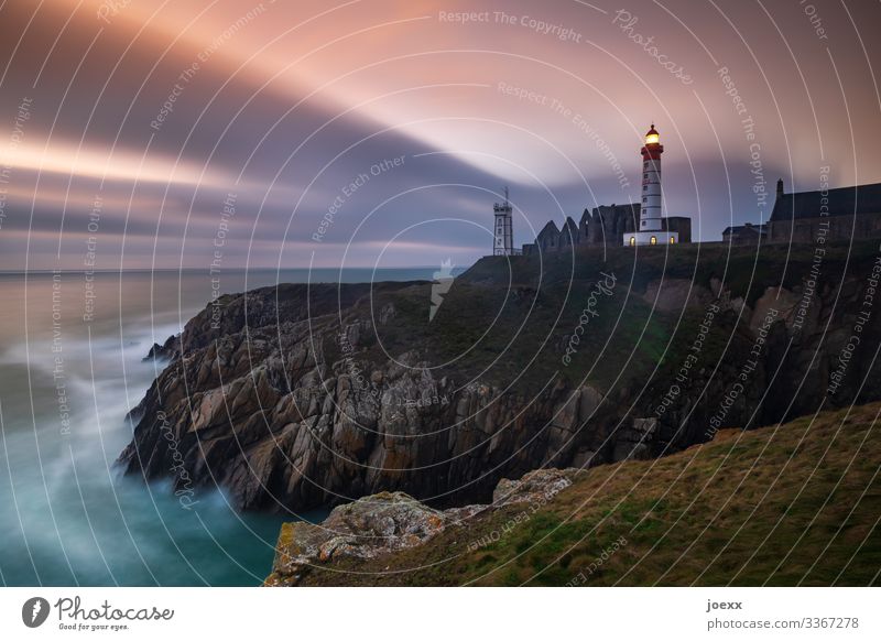 Lighthouse on rocky cliff, long exposure Blue Rock Waves Beautiful weather Sky coast Ocean Horizon Colour photo Multicoloured Exterior shot Clouds Maritime