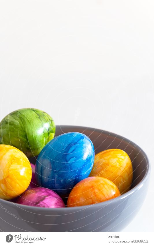 colourful easter eggs in a grey bowl against a white background Easter eggs Food Egg Nutrition Breakfast Buffet Brunch Organic produce Vegetarian diet Fasting