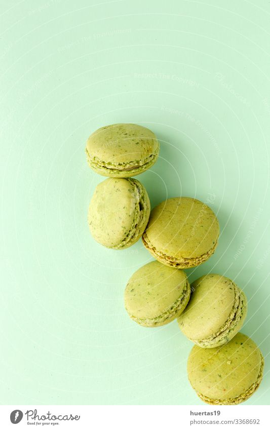 Homemade green macarons seen from above Food Dessert Candy Elegant Delicious Green Colour Tradition french Macaron sweet Snack colorful Bakery Tasty Gourmet