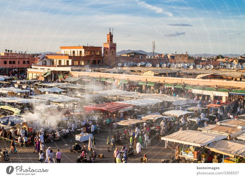 Jamaa el Fna market in sunset, Marrakesh, Morocco, Africa. Vacation & Travel Tourism Trip Business Culture Landscape Town Places Building Tradition jamaa fna