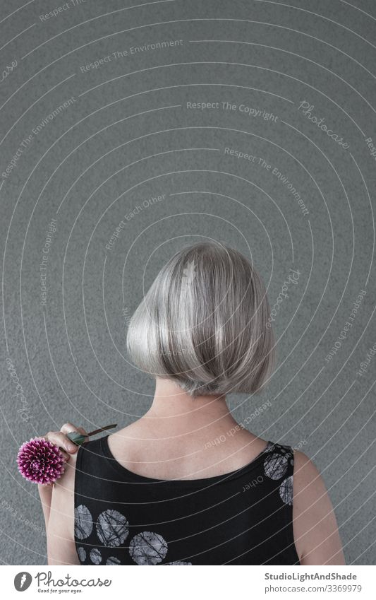Lady with silver hair and red dahlia Lifestyle Elegant Style Beautiful Hair and hairstyles Health care Gardening Human being Woman Adults Flower Fashion Dark