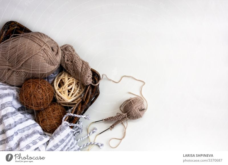 brown knitted fabric with large knitting needles Stock Photo