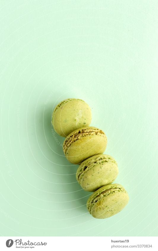 Homemade green macarons seen from above Food Dessert Candy Elegant Delicious Green Colour Tradition french Macaron sweet Snack colorful Bakery Tasty Gourmet