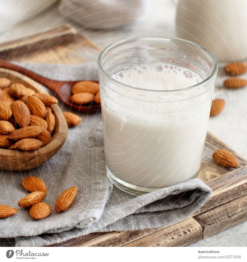 Vegan almond milk, non dairy alternative milk Vegetable Nutrition Breakfast Vegetarian diet Diet Beverage Spoon Fresh Natural Alternative almonds Vegan diet