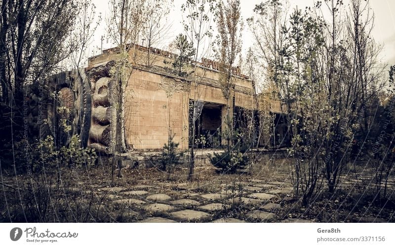 abandoned empty cinema with the name Prometheus in Chernobyl Autumn Tree Old Gloomy Dangerous Environmental pollution Destruction Ukraine abandoned city