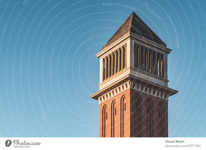 Venetian tower at sunset under a blue sky Landscape Sky Capital city Building Architecture Brick Colour Blue sky venetian venetian tower Sunset Afternoon