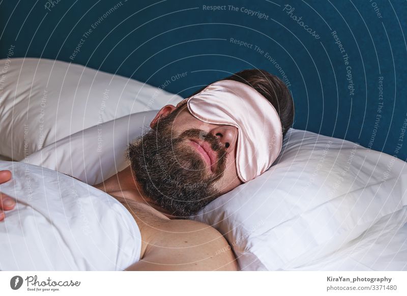 Closeup portrait of bearded man in eyemask sleeping in bed Lifestyle Face Relaxation Vacation & Travel Bedroom Human being Man Adults Fashion Accessory Sleep