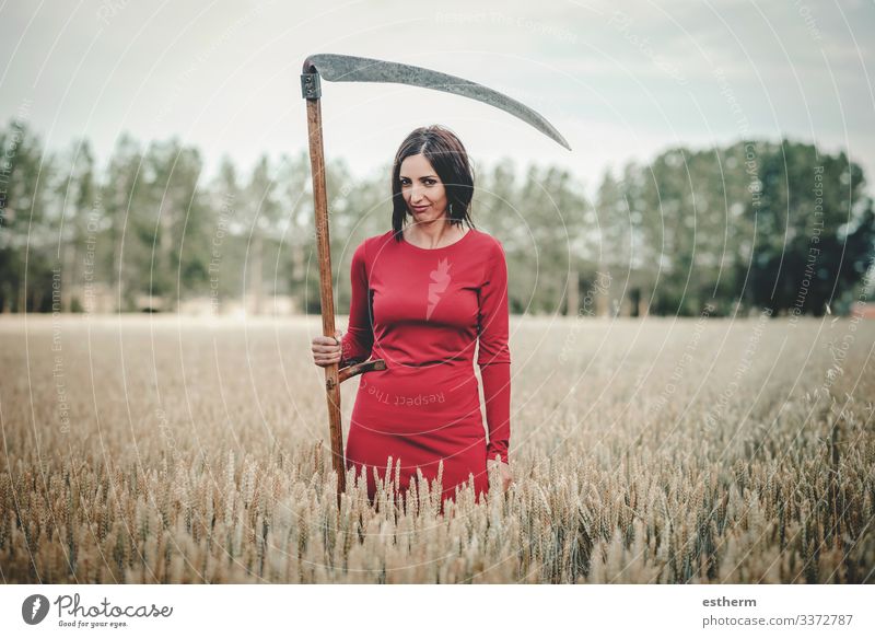 Young Woman with scythe in the forest Lifestyle Elegant Beautiful Freedom Hallowe'en Human being Feminine Young woman Youth (Young adults) Adults 1