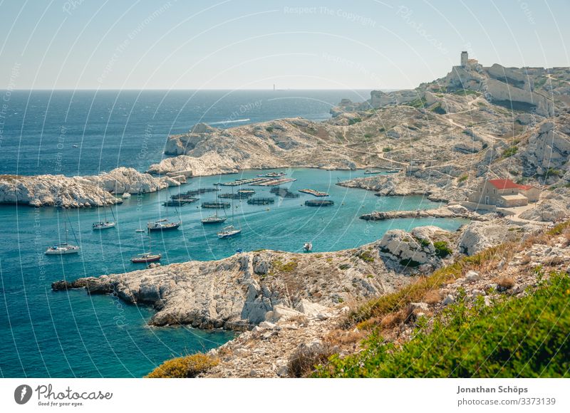 Fortress and port on island off Marseille Sunlight Light Day Copy Space top France Hot South Colour photo Southern France Ocean Mediterranean sea Rock formation