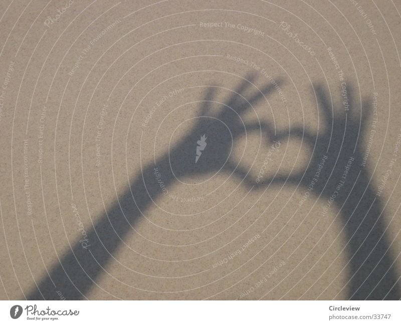 Heart shadow on the beach Happy Summer Sun Human being Hand Sand Love Emotions Shadow play Women`s hand Sincere Public Holiday play with light Light