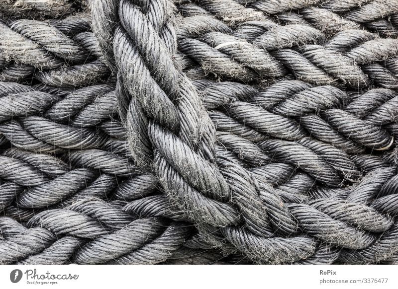ship rope tied in the harbor - a Royalty Free Stock Photo from Photocase