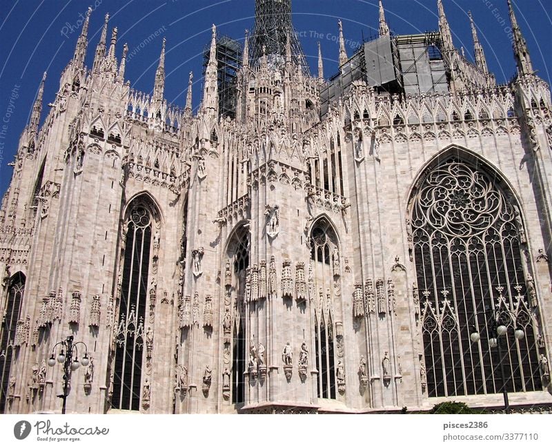 Windows and white marble architecture of the cathedral in Milan Skyline Dome Facade Air Traffic Control Tower Religion and faith Kite history landmark Italy