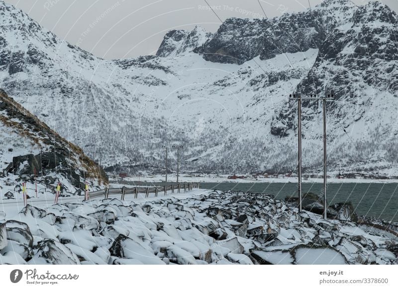 Winter landscape on the Lofoten Islands Vacation & Travel Snow Environment Nature Landscape Ice Frost Rock Coast Ocean Traffic infrastructure Street Cold