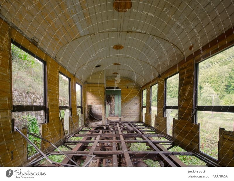Lost journey to a forgotten place through green landscapes Track ghost train Decline Transience Broken Subdued colour Wide angle Railroad car Change